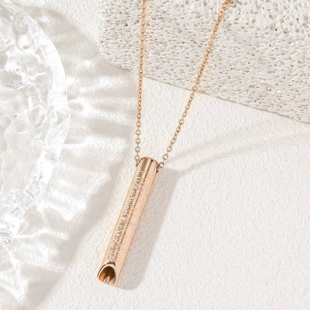 Rose gold stress-relief pendant